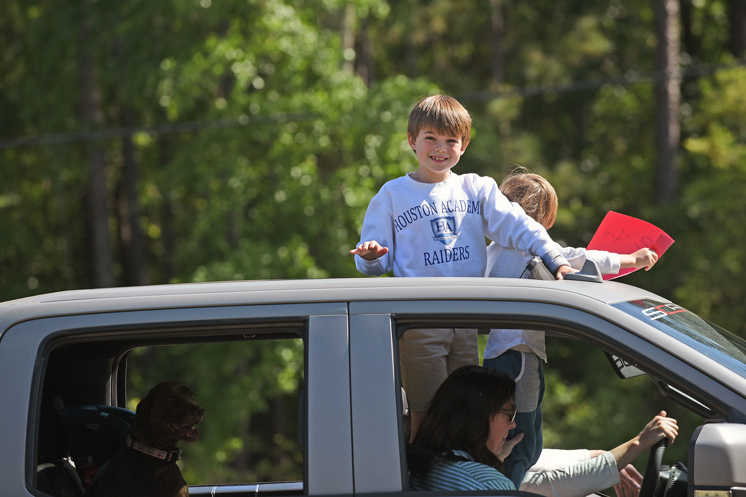 Teachers hold parade for students at Houston Academy